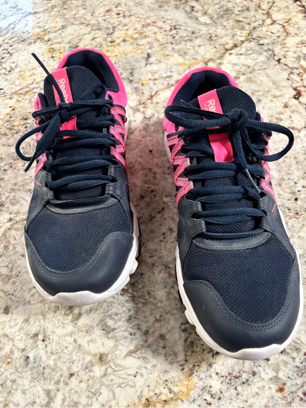 Reebok Women’s Navy Athletic Shoes with Pink Accents